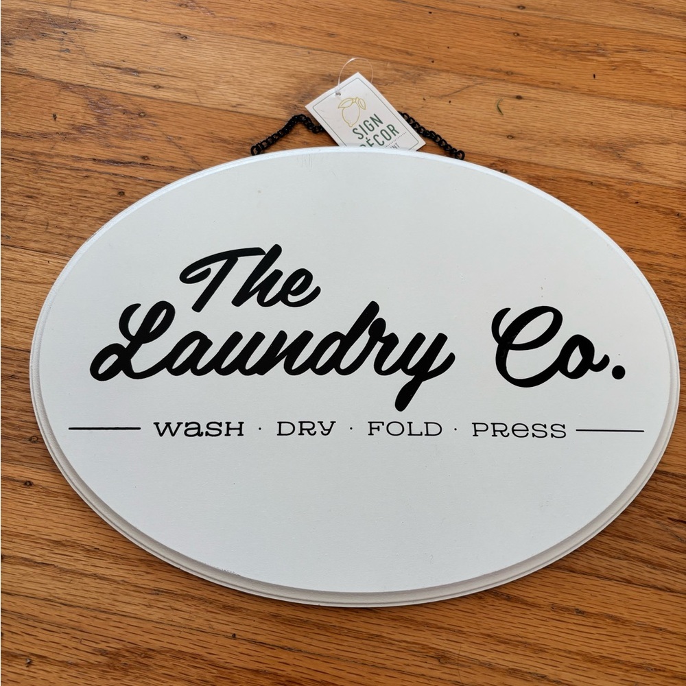 The Laundry Company Oval Wall Sign Plaque White & Black Wash Dry Press